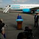 Clinton speaks to reporters September 8 at the Westchester County Airport in White Plains, NY. Photo via AP.